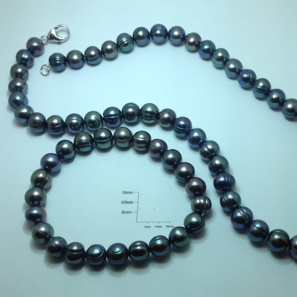 Black Freshwater Pearl Necklace And Stretch Bracelet 40$